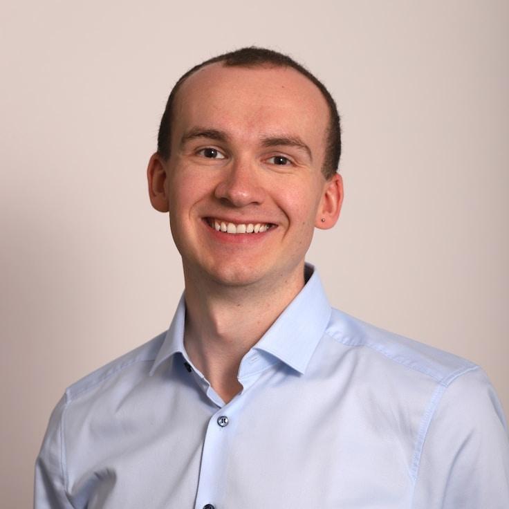 Jordan Kim, Client Relations Director, discussing corporate gifting strategy with business clients